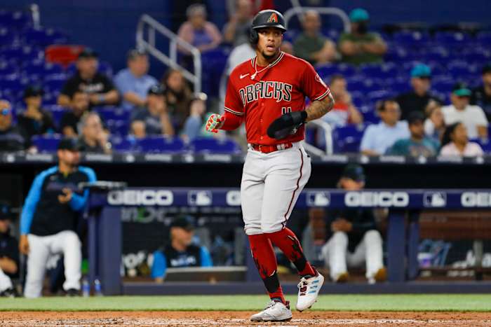 Ketel Marte scores against the Miami Marlins.